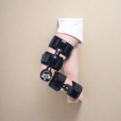 Appareil de soutien pour la fixation postopératoire de l'immobilisateur de genou orthopédique métallique