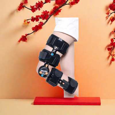 Instrument orthopédique de fixation externe de l' articulation du genou pour un traitement orthopédique personnalisé