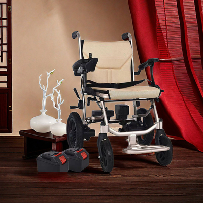 Conception de fauteuil roulant électrique pour voyageurs handicapés pliable portable et adapté à l'avion